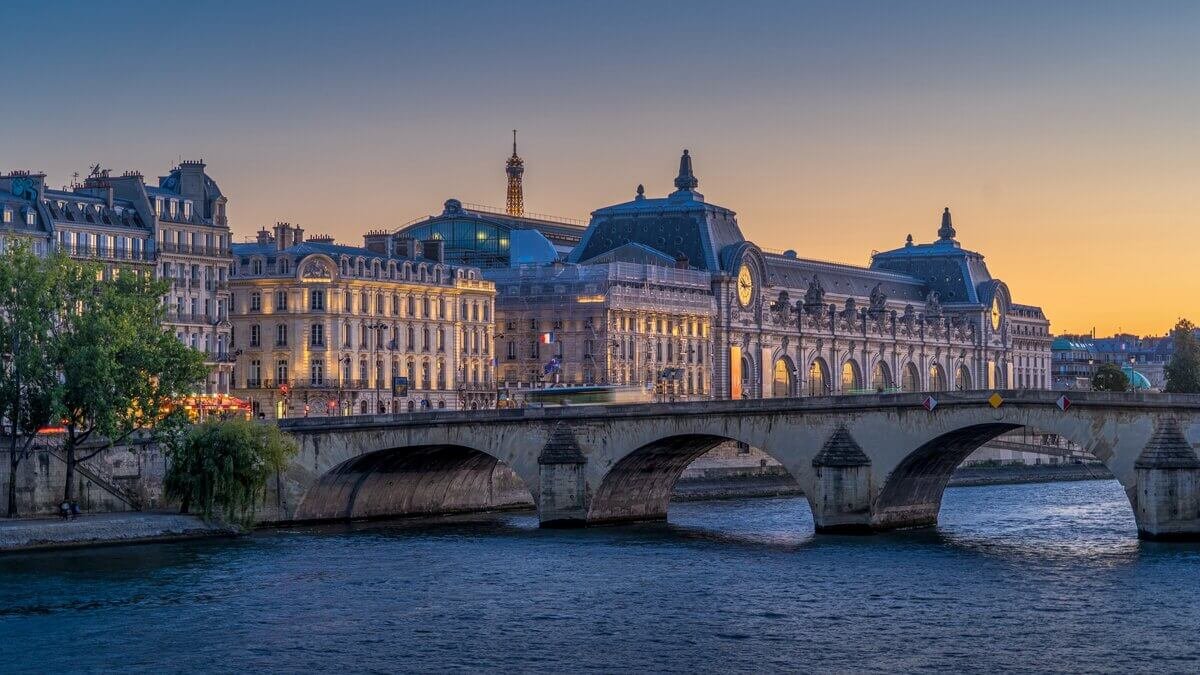 View of the Musee d'Orsay and Eiffel Tower in Paris representing travel to France.